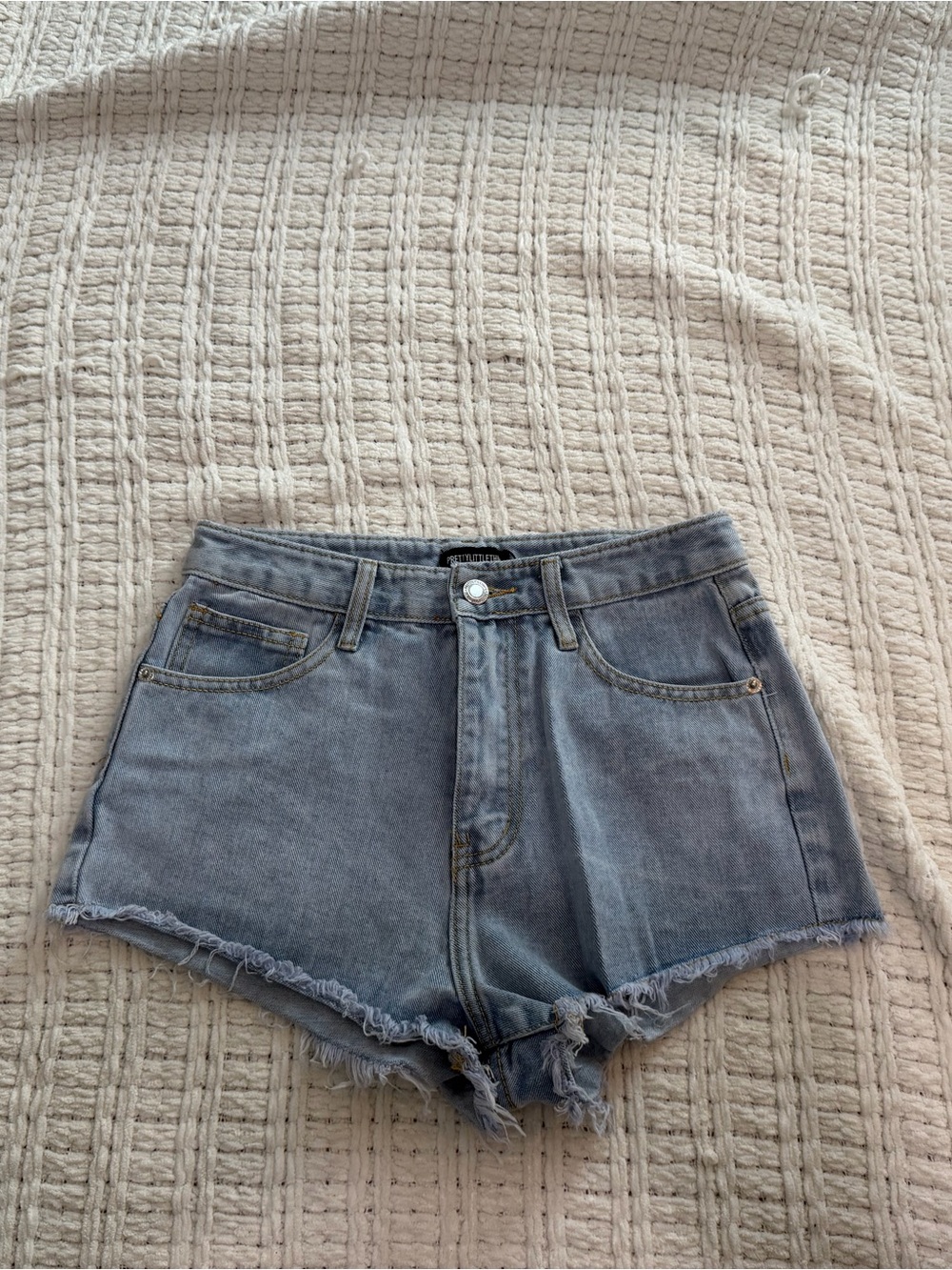 PrettyLittleThing Light Blue Distressed Denim Shorts